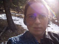 me - smiling in back woods.jpg